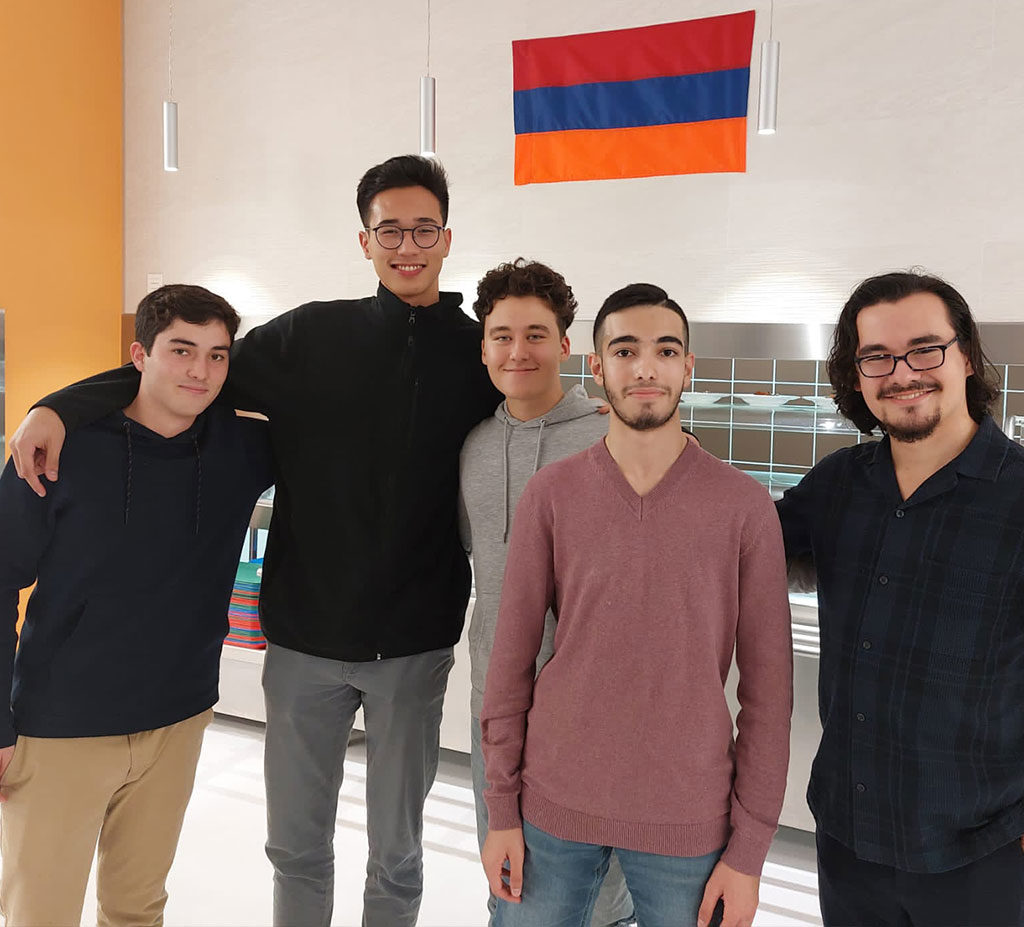 friends at colegio mayor larraona with the flag of armenia